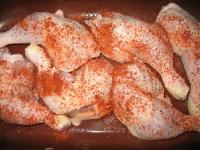 Wash chicken legs, season them with salt, sprinkle...