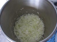 Peel an onion, chop it finely. Melt lard in a...