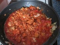 Add the tomato puree. Mix everything well and...