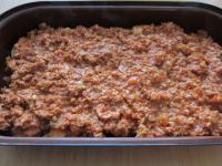 Add the meat mixture and spread it evenly....