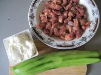 Peel a cucumber for tzatziki and grate it. Mix...