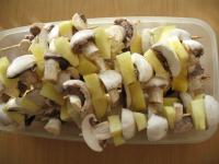 Clean the mushrooms and cut them in half. Cut the...