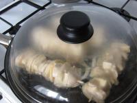 Heat oil in a pan, immerse the tofu skewer in the...