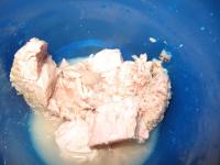 Open canned tuna and place the content together...