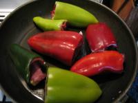 Warm a little oil in a pan. Put the peppers in a...