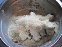 Crumble biscuits in electric mixer. Blend them in...