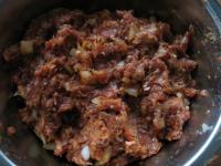 Finely chop the onion. Combine minced meat with...