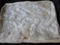 Use a rolling pin to spread the puff pastry until...