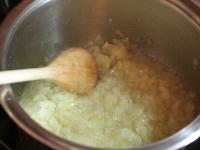 Fry two finely chopped onions over the lard. ...