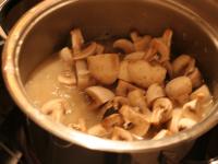 Add quartered mushrooms. ...