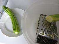 Trim the zucchini, wash and rougly grate....