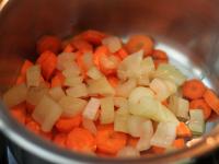 Cook carrot, cut into small pieces and ribbed...