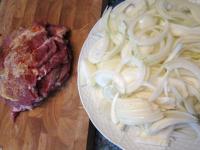 Layer the meat and prepare the onion. Peel it and...