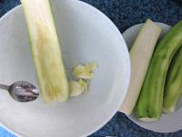 Cut three medium-sized zucchini in half. Hollow...