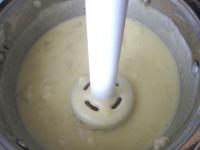 Use a hand blender to mix the sauce, pour in milk...