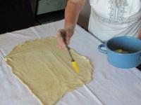 Start dough to stretch on the tablecloth. From...