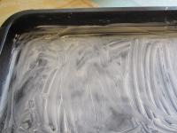 Grease and flour baking tin so that the dough can...