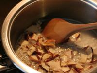 Boil flakes and ½ cup of chopped dried apples in...