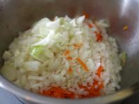 Add finely chopped onion into the grated squash....