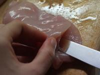 With long sharp knife create bags into the meat. ...