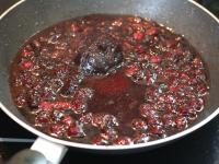 In a skillet, cook the cranberries, balsamico...