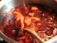 Add tomatoes chopped into a smaller pieces into...