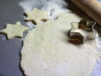 Roll out the dough on the floured board and cut...