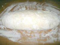 After rising, tip the dough on a floured board,...