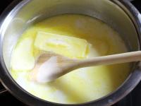 Melt butter in milk in a pot over medium heat....