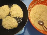 Heat the oil in a frying pan and put parts of...