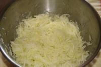 Shred the zucchini roughly and add salt a bit. ...