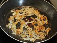 Cut onion into half moon shapes and cook in oil...