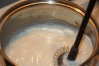 Pour in mixed custard and cook a thick cream. ...