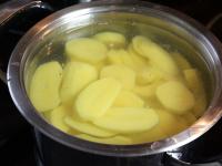 Peel potatoes and cut them into slices. ...