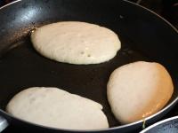 Pour the dough in the oiled pan into crumpet...