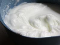 Beat the egg whites until fluffy and slightly stir...