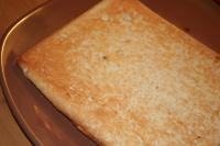 Pour pastry on a small (20 x 30 cm) baking tin...