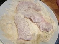 Mix the flour with breadcrumbs and salt. Coat the...