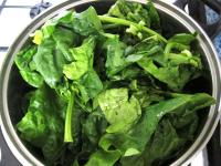 Wash fresh spinach leaves and discard possible...