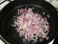 Finley chop onion. Melt lard in a pan and cook...