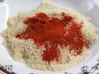 Prepare triple coating: flour, egg seasoned with...