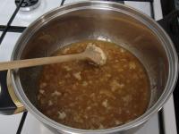 Melt sugar while stirring frequently and prepare a...