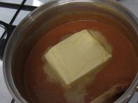 Add butter to the hot mixture and stir until the...