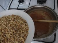 At the end pour in walnuts and stir the mixture...