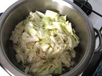 Chop the cabbage finely, add it to the onion,...