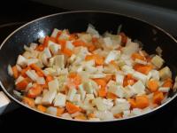 Put finely chopped vegetables in a pan with oil...