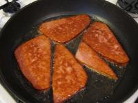 Fry the meatloaf in a pan with a little oil on...