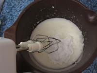 Beat egg whites to make dense foam and stir sugar...