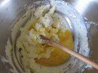 Add 2/3 of whipped eggs. Keep 1/3 for spreading....