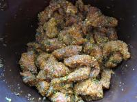 Pour meat with oil into the dry mixture, mix it...